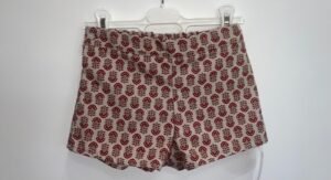 PANTALON CORTO FLOR BURDEOS